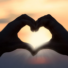 Image of two hands forming the shape of a heart